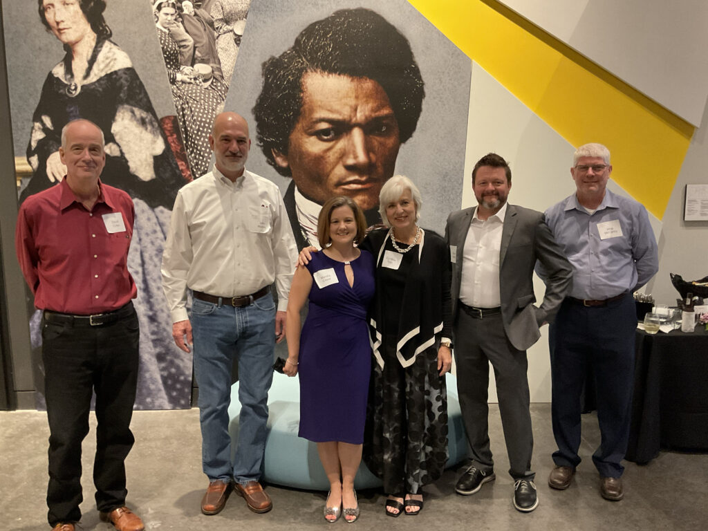 Members of the Solid Light team pose in a group photo at the American Civil War Museum opening reception in June 2022